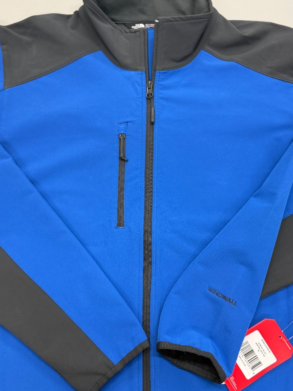 The North Face tech stretch soft shell men’s blue jacket